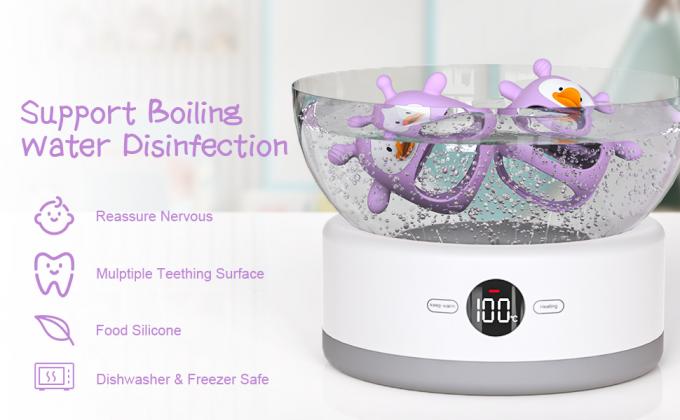 het speelgoed van het babytandjes krijgen